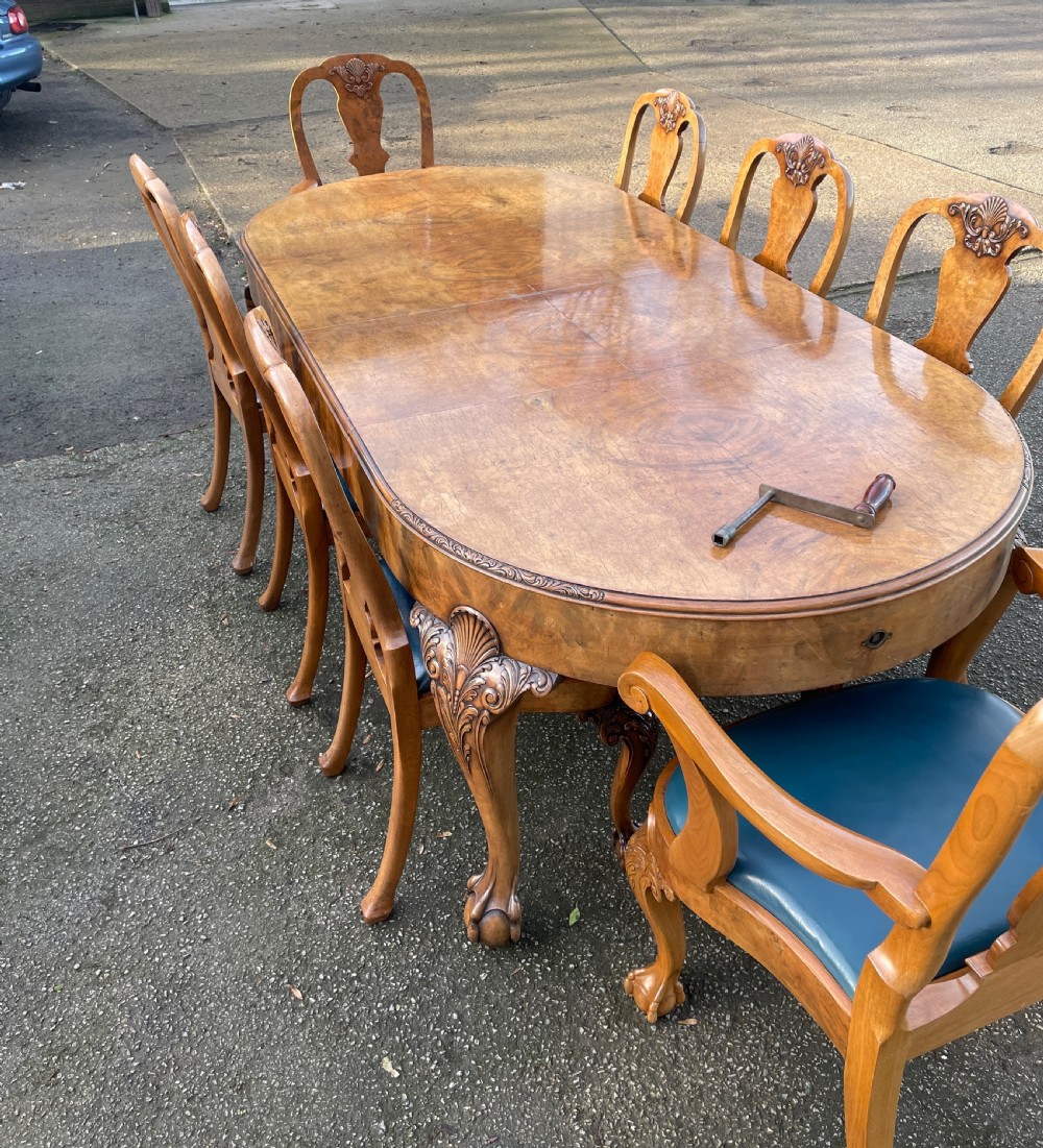 Burr walnut Queen Anne 8 seater wind out table and eight chairs by Charles Walker of Harrogate  View III