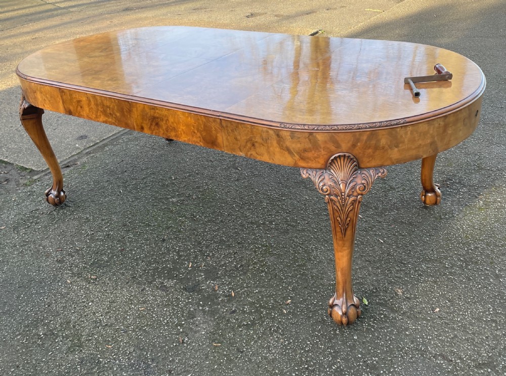 Burr walnut Queen Anne 8 seater wind out table and eight chairs by Charles Walker of Harrogate  View V