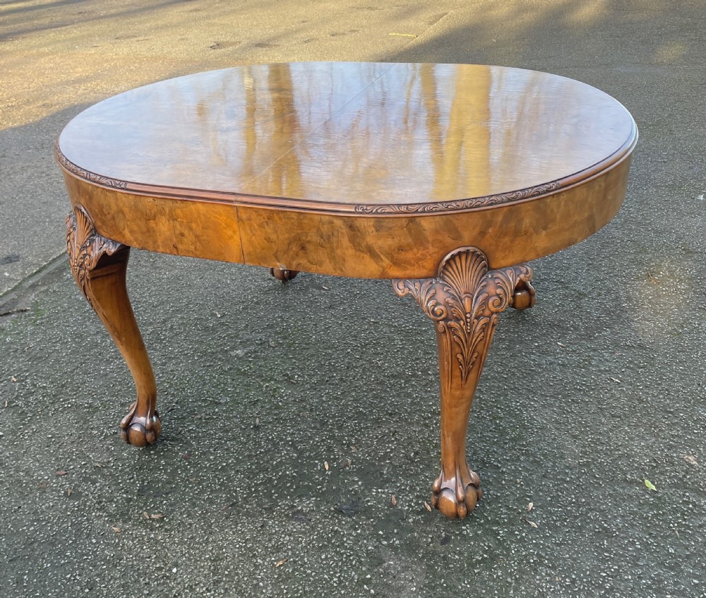 Burr walnut Queen Anne 8 seater wind out table and eight chairs by Charles Walker of Harrogate  View VIII
