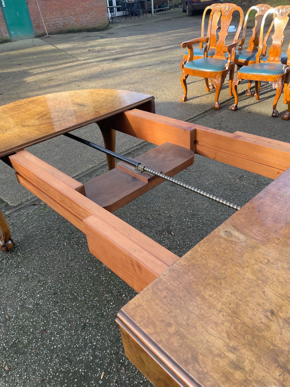 Burr walnut Queen Anne 8 seater wind out table and eight chairs by Charles Walker of Harrogate  View XX