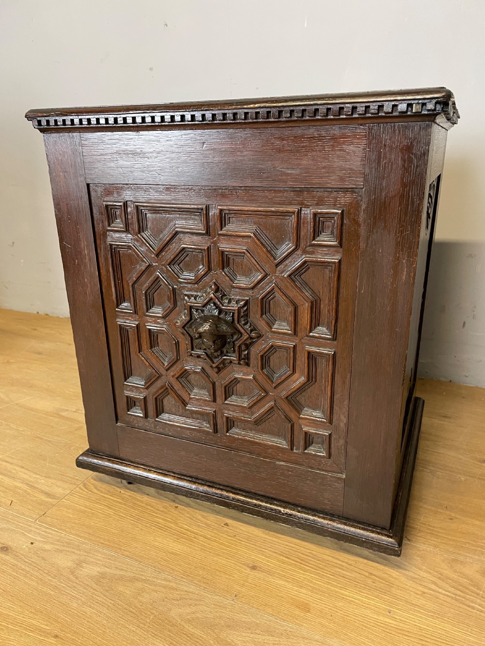 C19TH solid oak carved log bin in Jacobean style  View IX