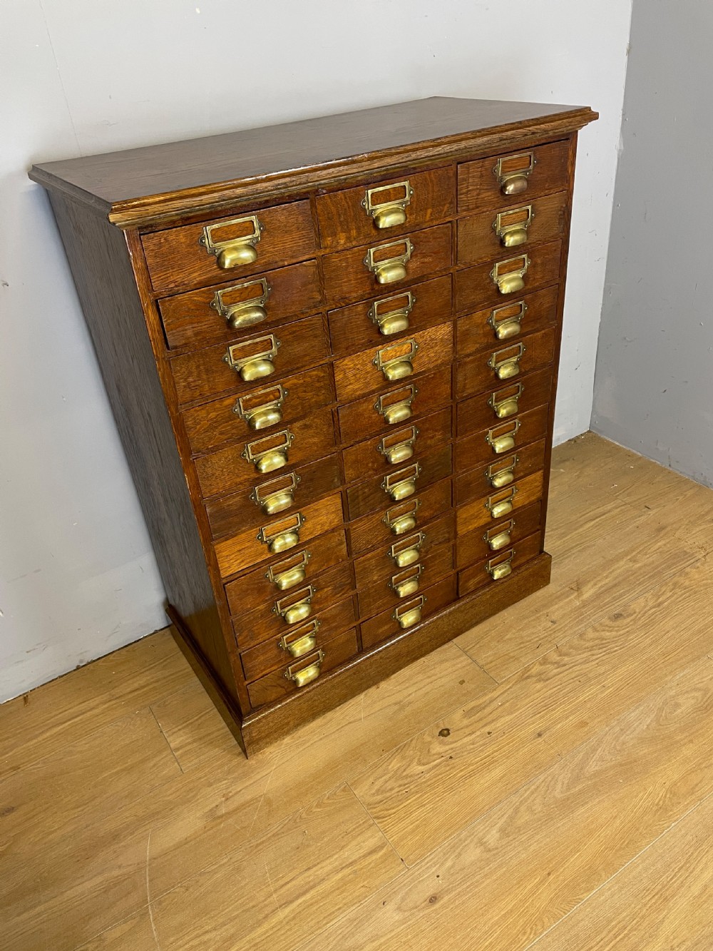 Edwardian cabinet of 33 oak filing drawers  View II