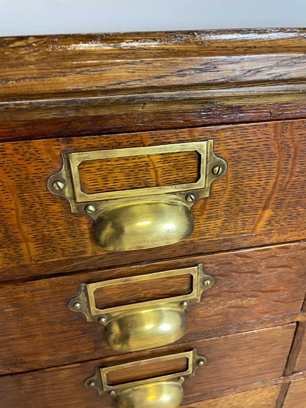 Edwardian cabinet of 33 oak filing drawers  View XII