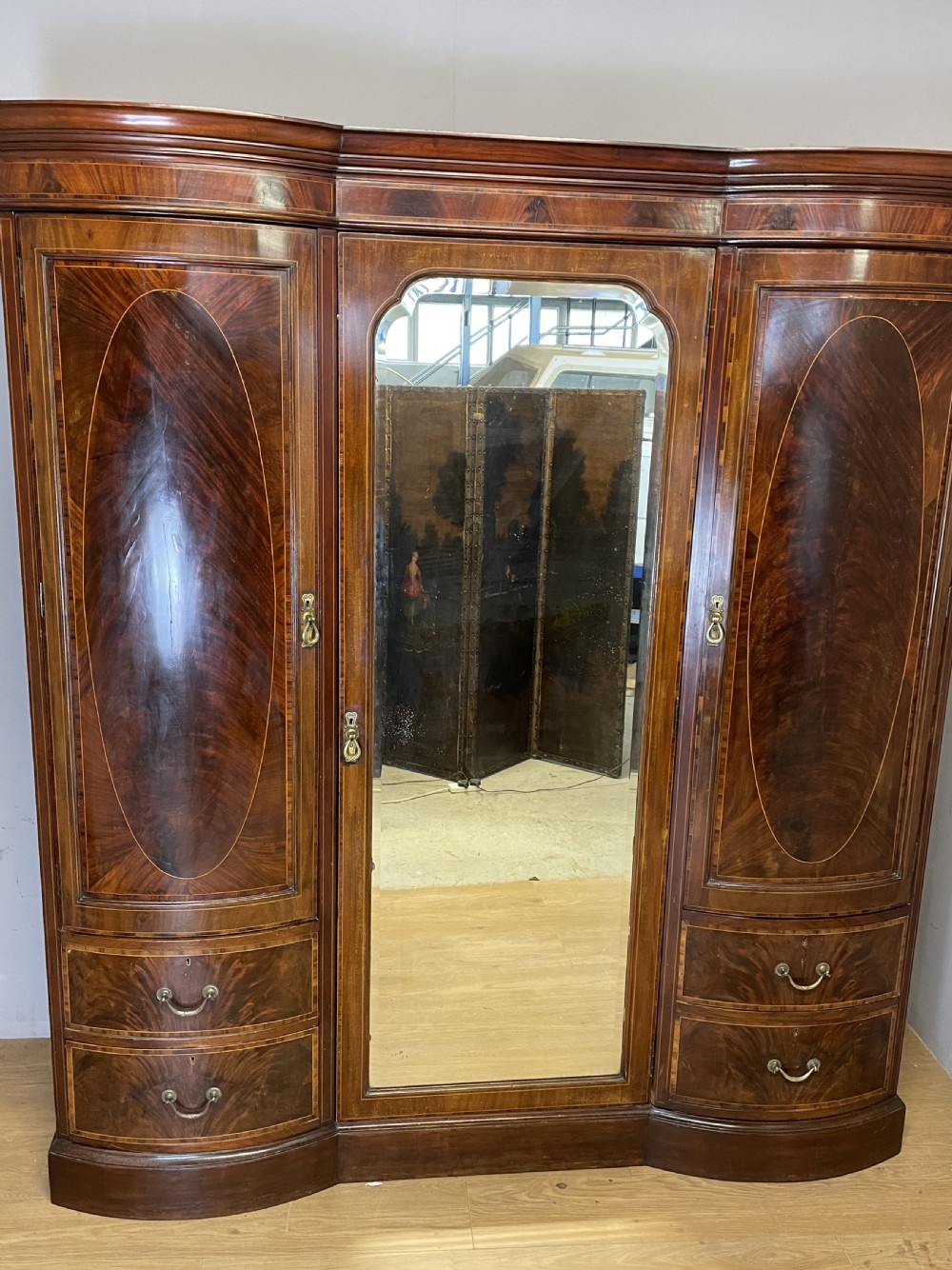 C19TH flame mahogany inlaid triple bow front wardrobe  View V