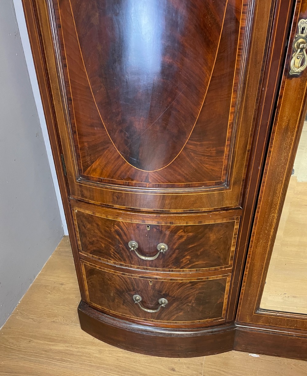 C19TH flame mahogany inlaid triple bow front wardrobe  View VI