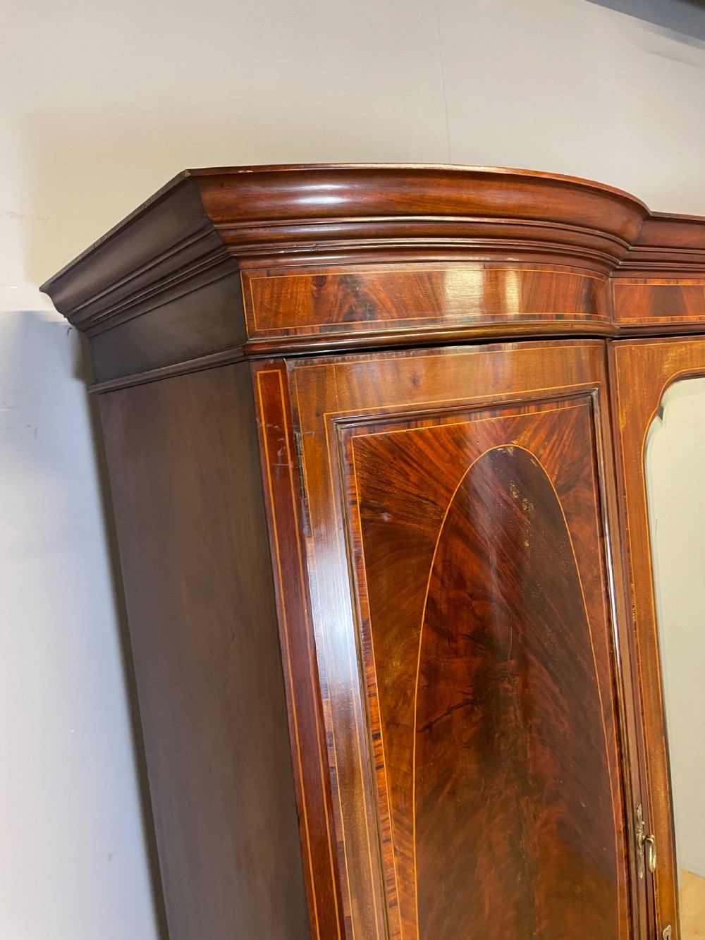 C19TH flame mahogany inlaid triple bow front wardrobe  View XVI