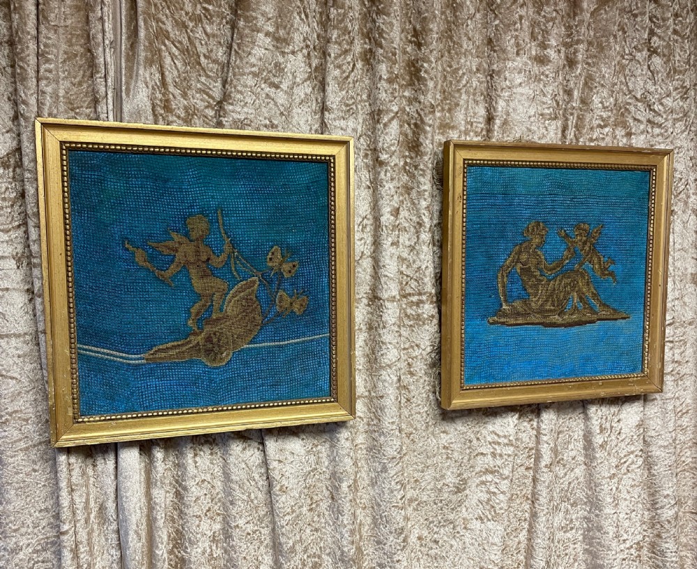 A pair of gilt-framed 19th-century needlework pictures featuring classical figures stitched in gold thread against a blue backdrop. View III