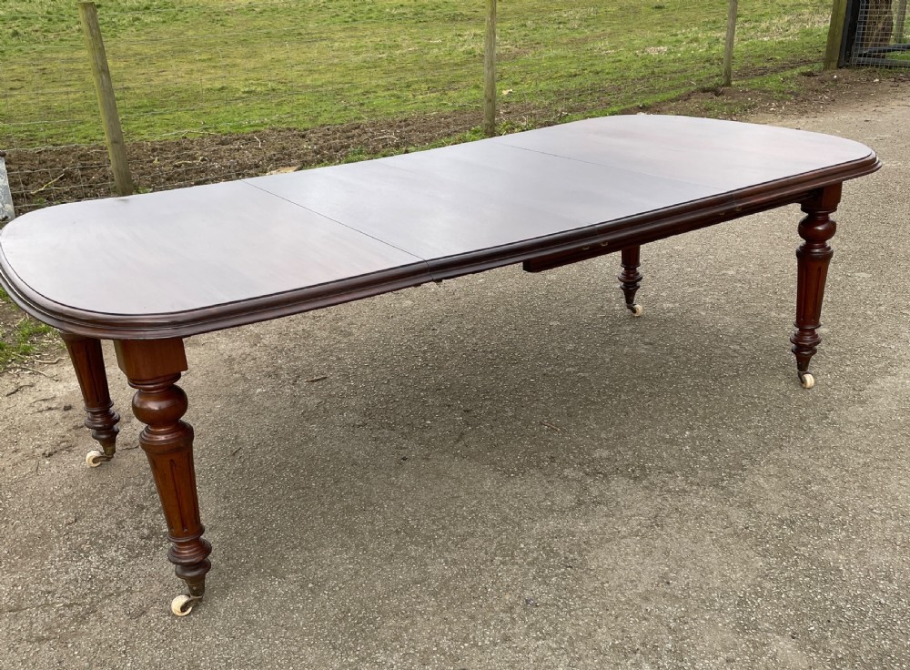 C19TH walnut eight seater wind out dining table  View II