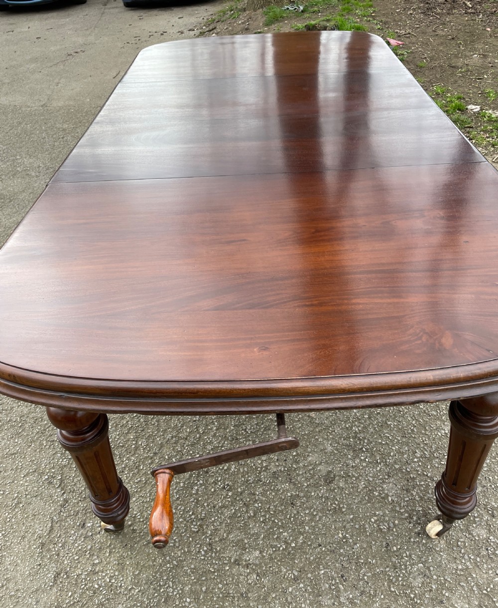 C19TH walnut eight seater wind out dining table  View III