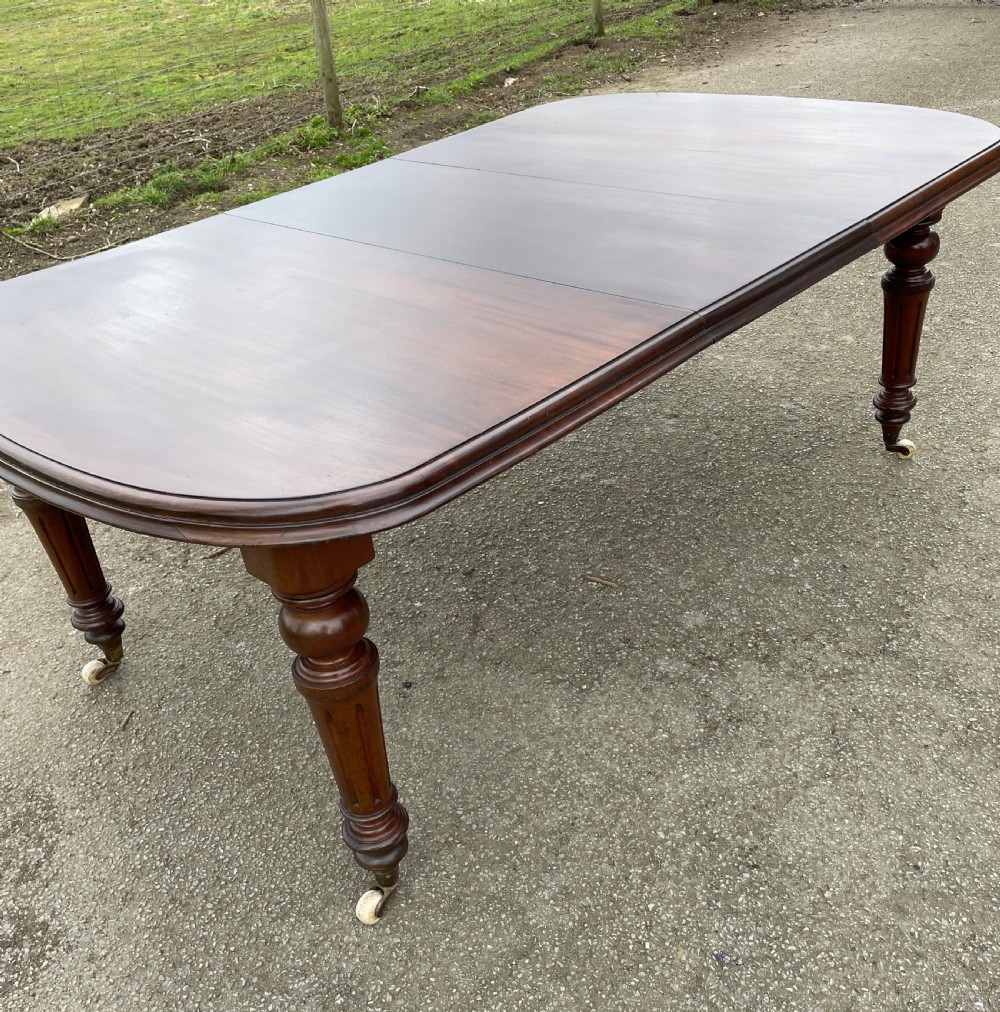C19TH walnut eight seater wind out dining table  View XI