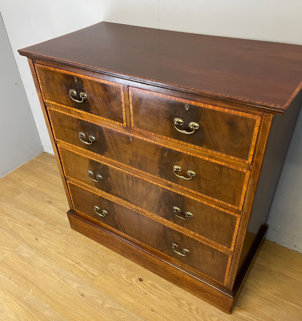 Edwardian flame mahogany inlaid chest of drawers  View II