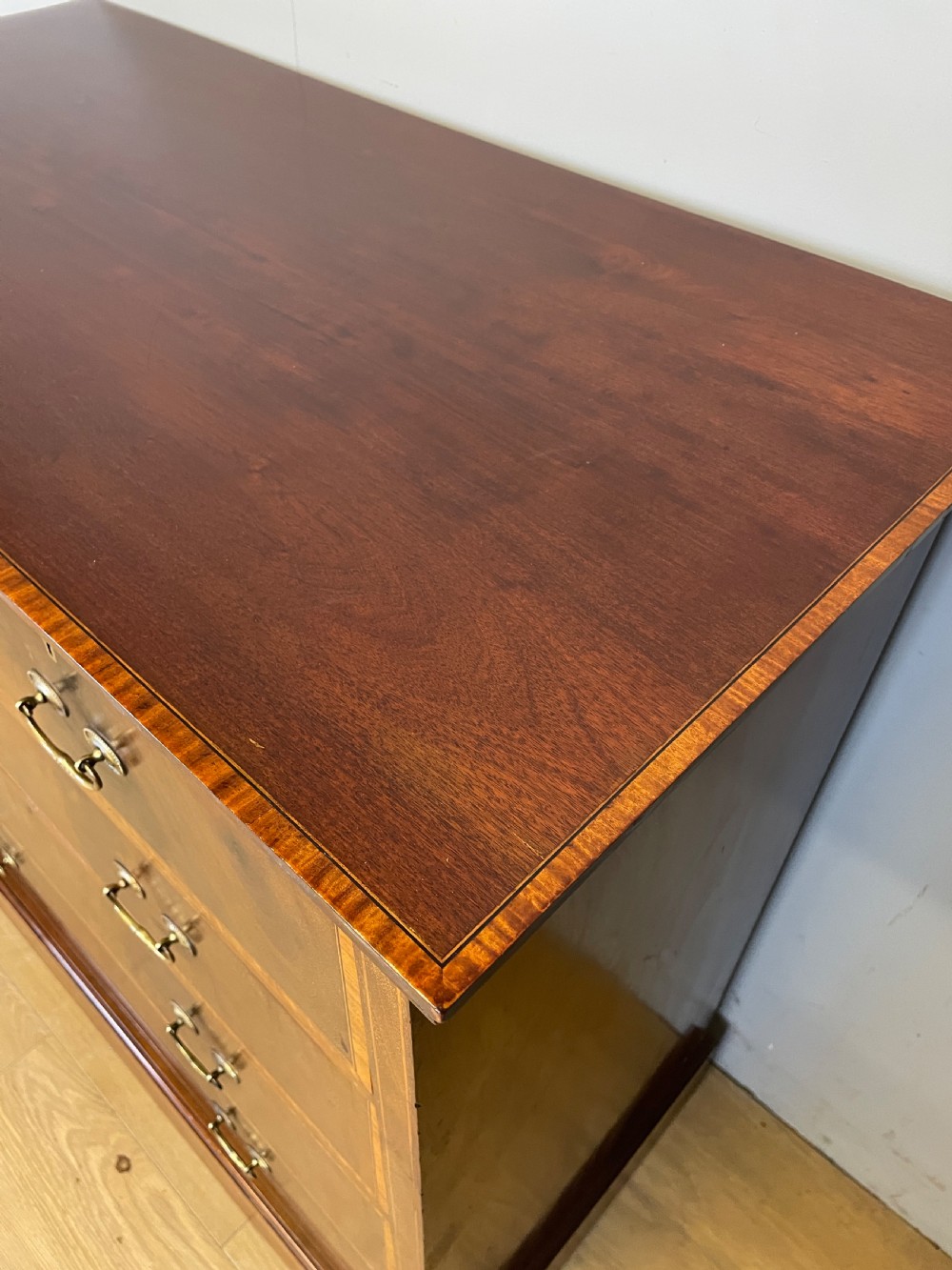 Edwardian flame mahogany inlaid chest of drawers  View III