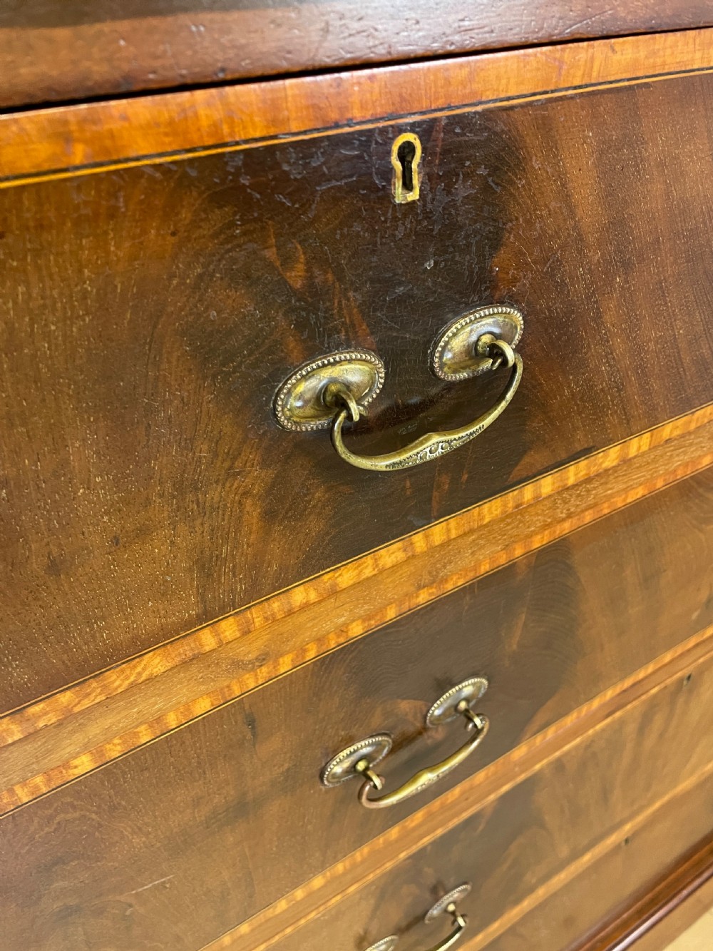Edwardian flame mahogany inlaid chest of drawers  View VI