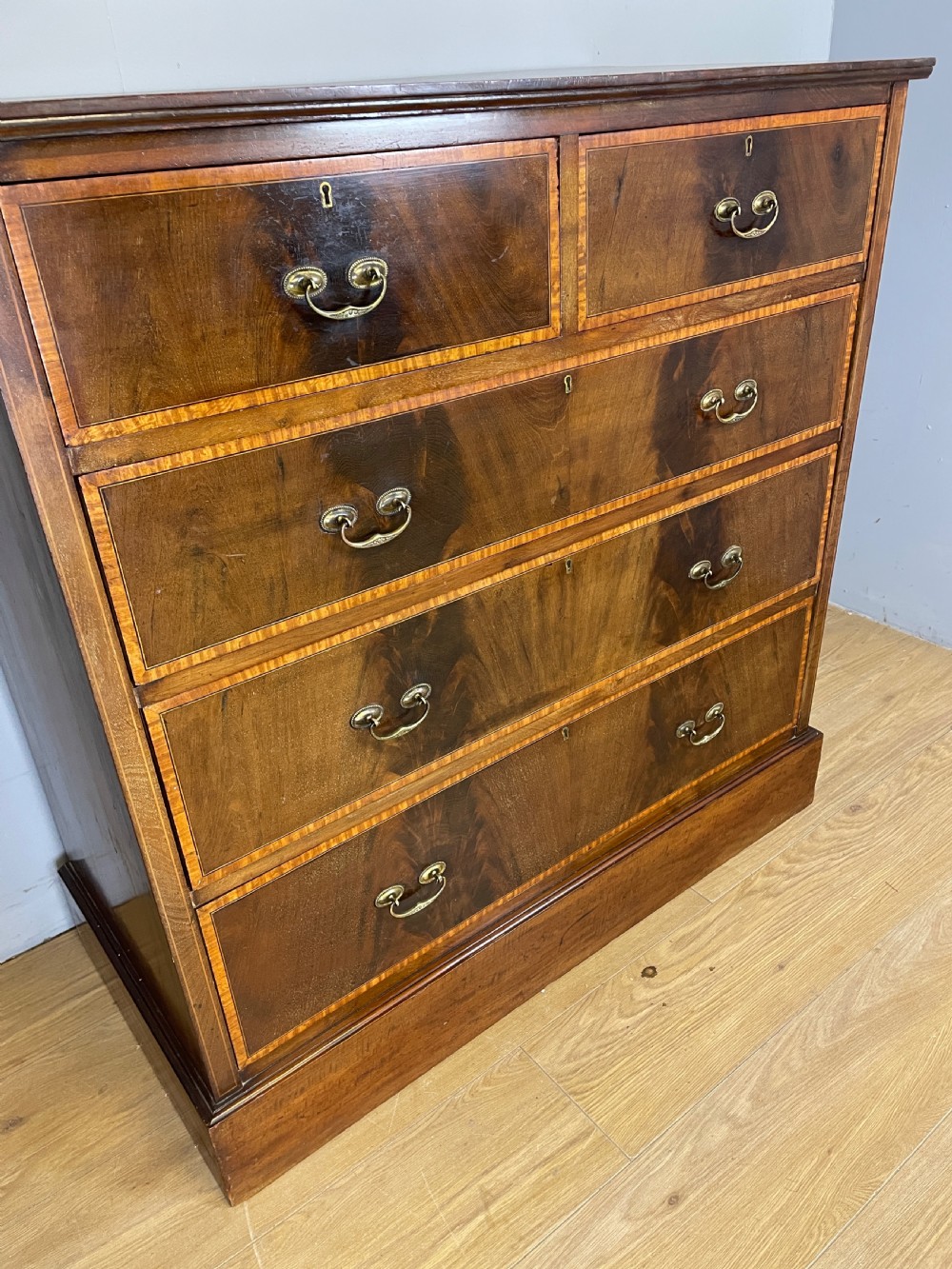 Edwardian flame mahogany inlaid chest of drawers  View VIII