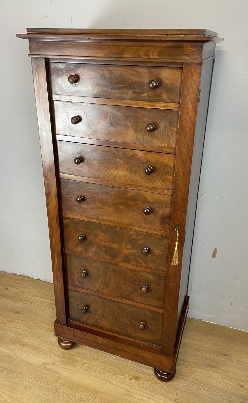 C19TH Large country house flame mahogany Wellington chest 