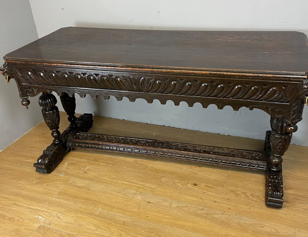 C19TH Jacobean style carved oak centre table  View XI