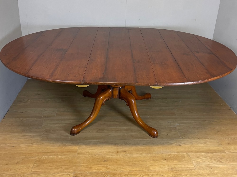 Solid cherry extending pedestal dining table circa 1930