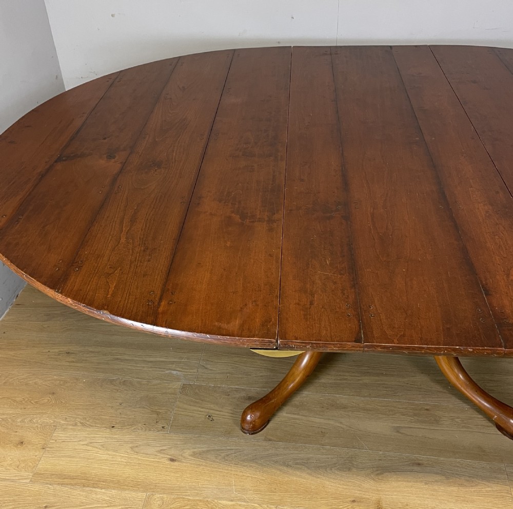 Solid cherry extending pedestal dining table circa 1930 View III