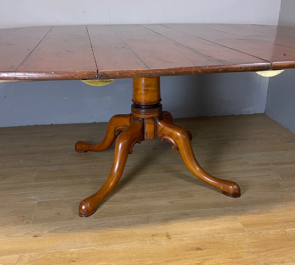 Solid cherry extending pedestal dining table circa 1930 View IV