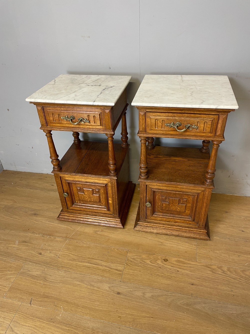 C19TH pair of French oak bedside cabinets with marble tops  View II