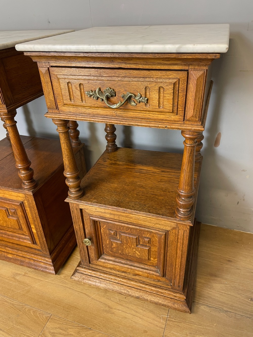 C19TH pair of French oak bedside cabinets with marble tops  View III