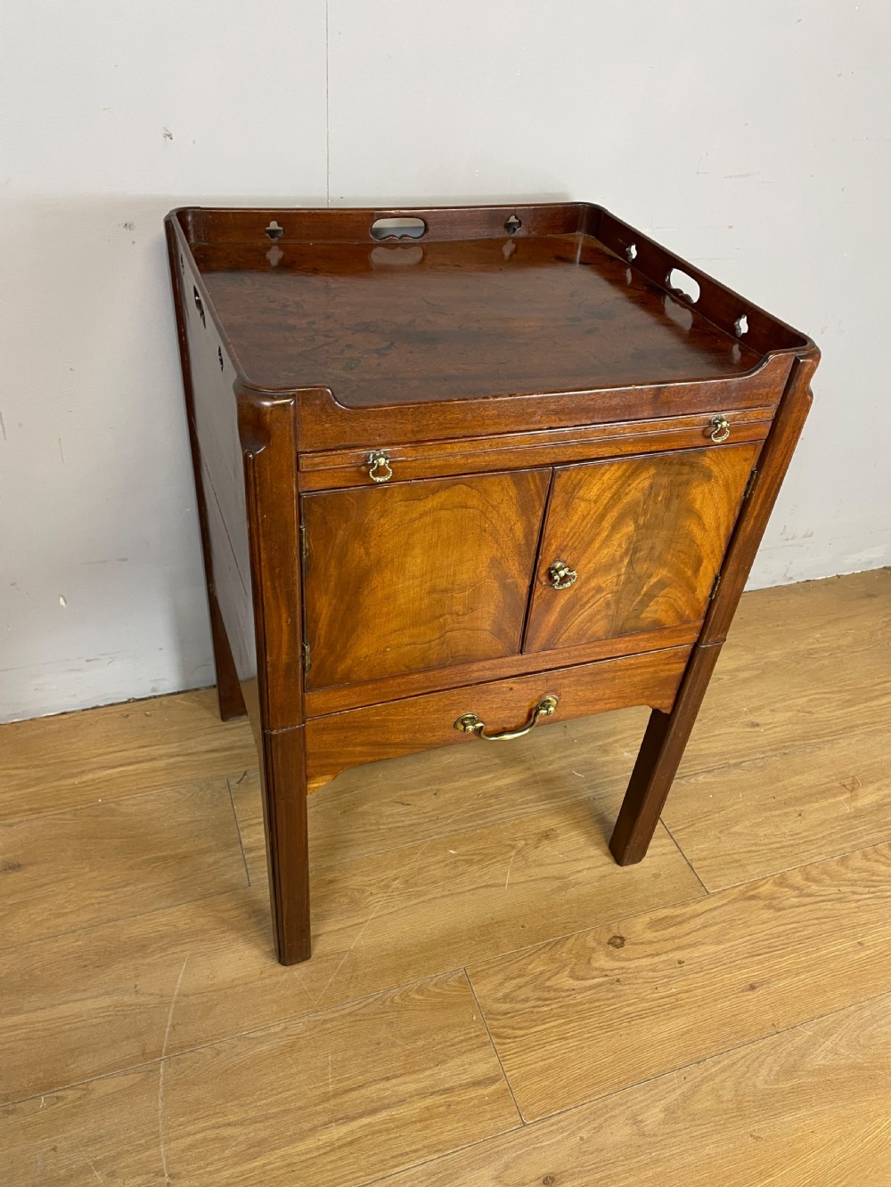 Georgian flame mahogany tray topped bedside cabinet 