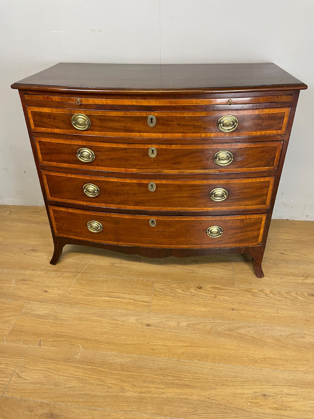 Georgian inlaid mahogany bow front chest of drawers 