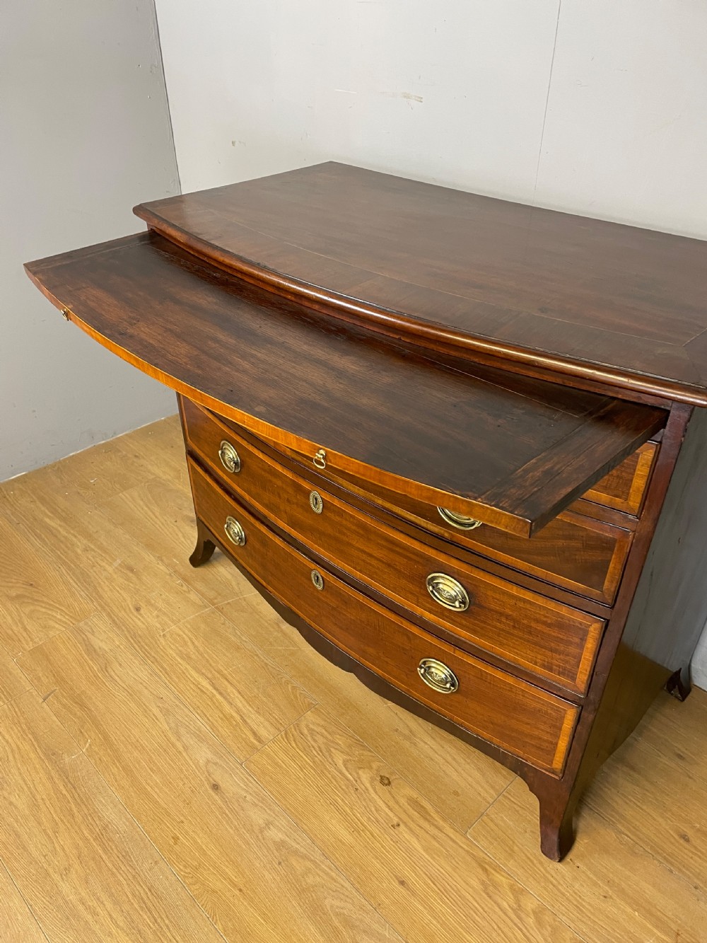 Georgian inlaid mahogany bow front chest of drawers  View VI