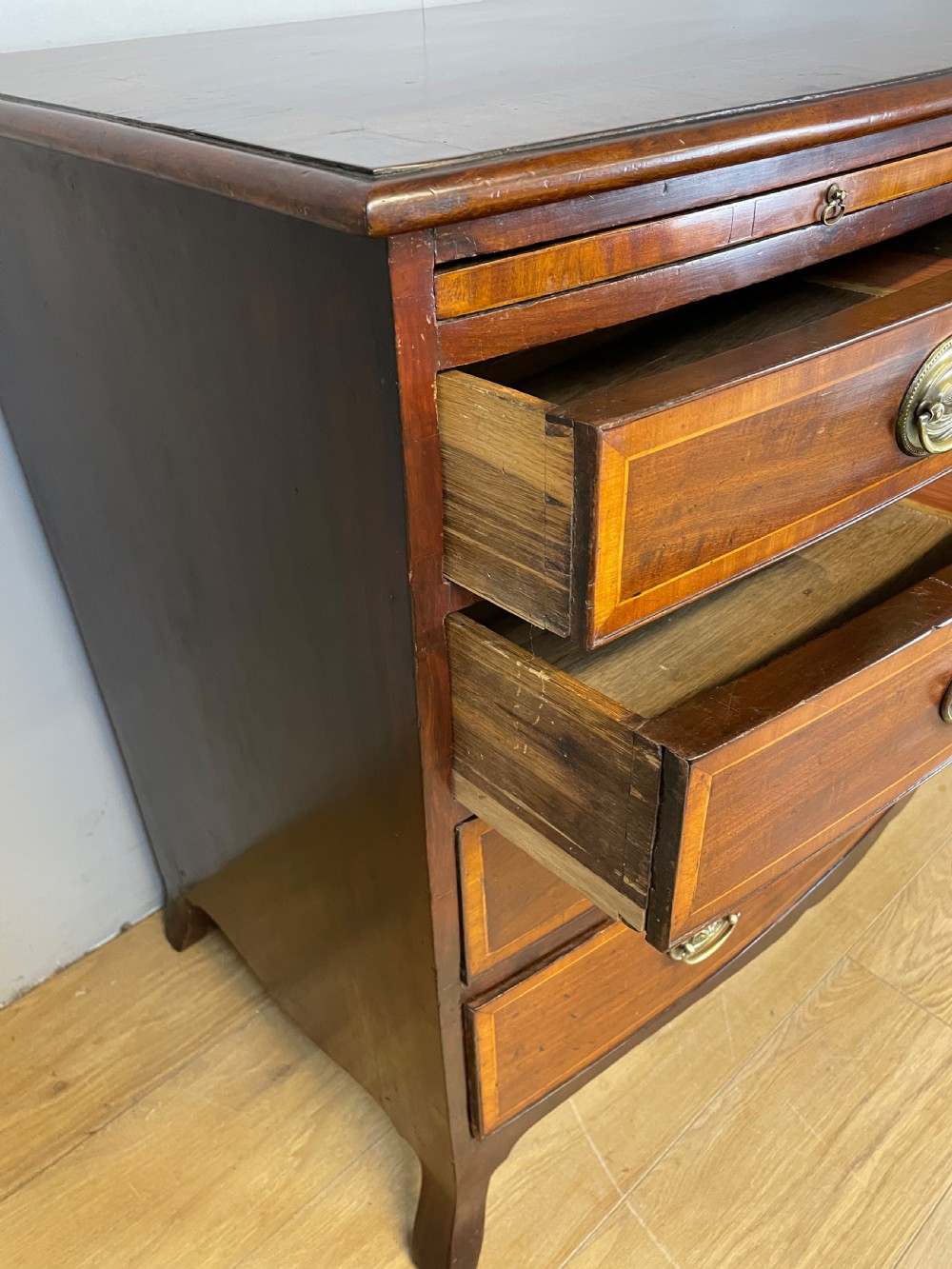 Georgian inlaid mahogany bow front chest of drawers  View VII