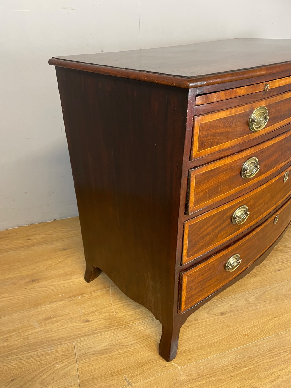 Georgian inlaid mahogany bow front chest of drawers  View VIII