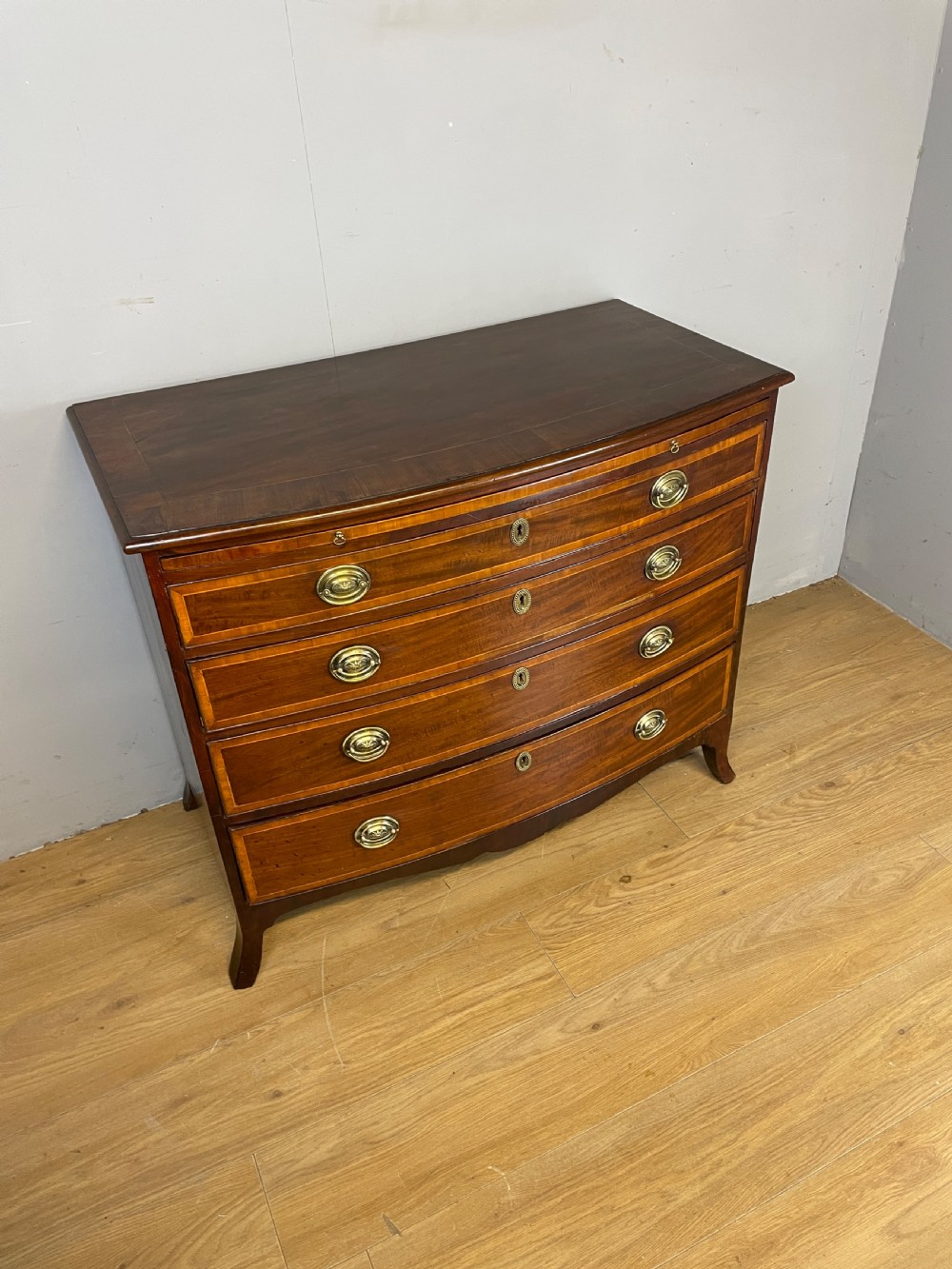 Georgian inlaid mahogany bow front chest of drawers  View XII