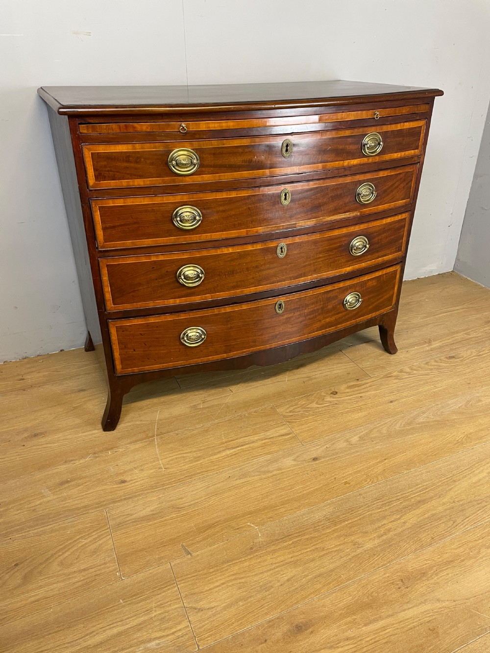 Georgian inlaid mahogany bow front chest of drawers  View XIII