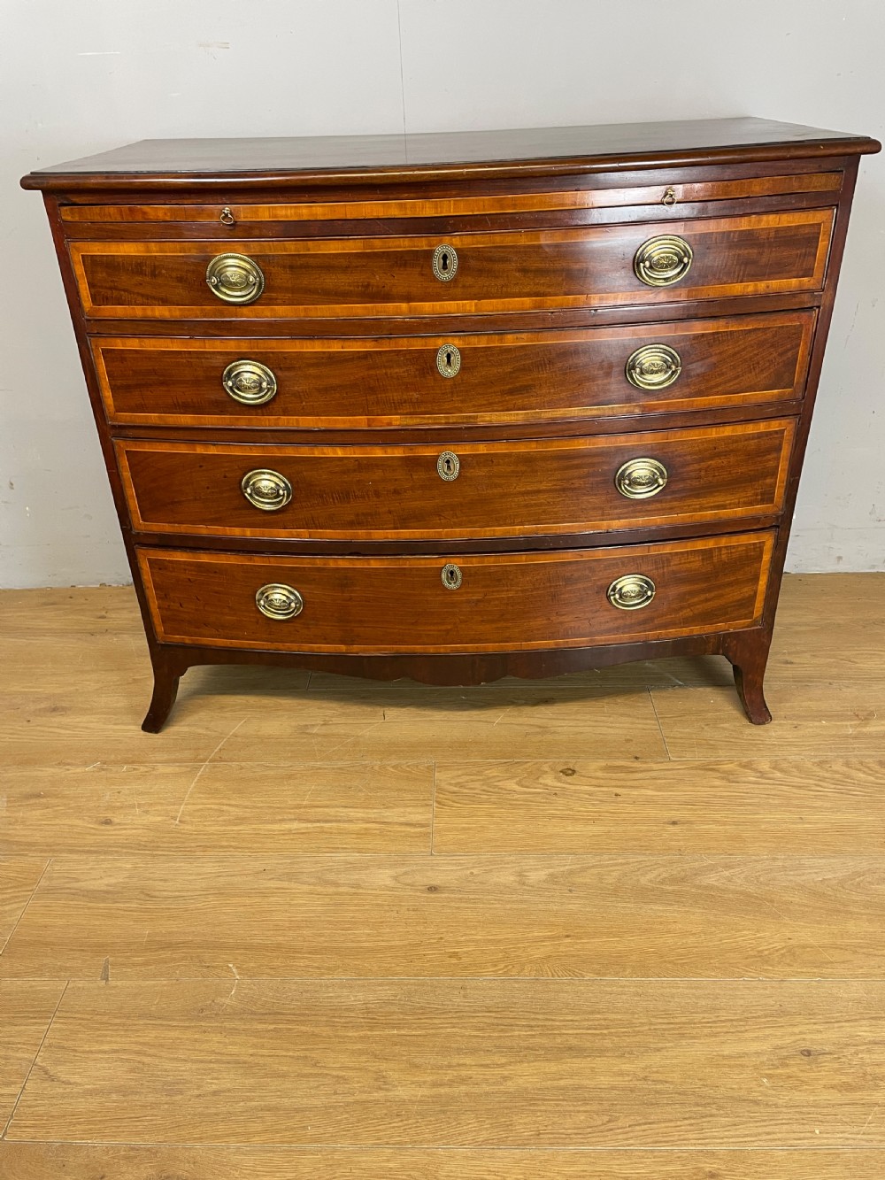 Georgian inlaid mahogany bow front chest of drawers  View XIV