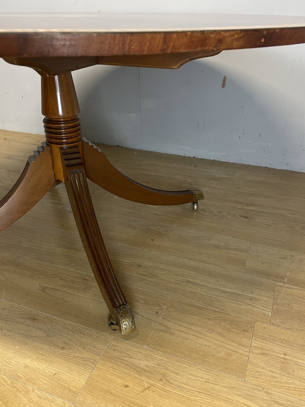 Flame mahogany regency style circular dining table circa 1920 View II
