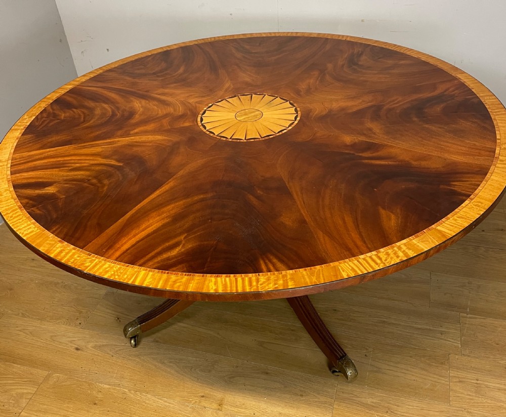 Flame mahogany regency style circular dining table circa 1920 View III