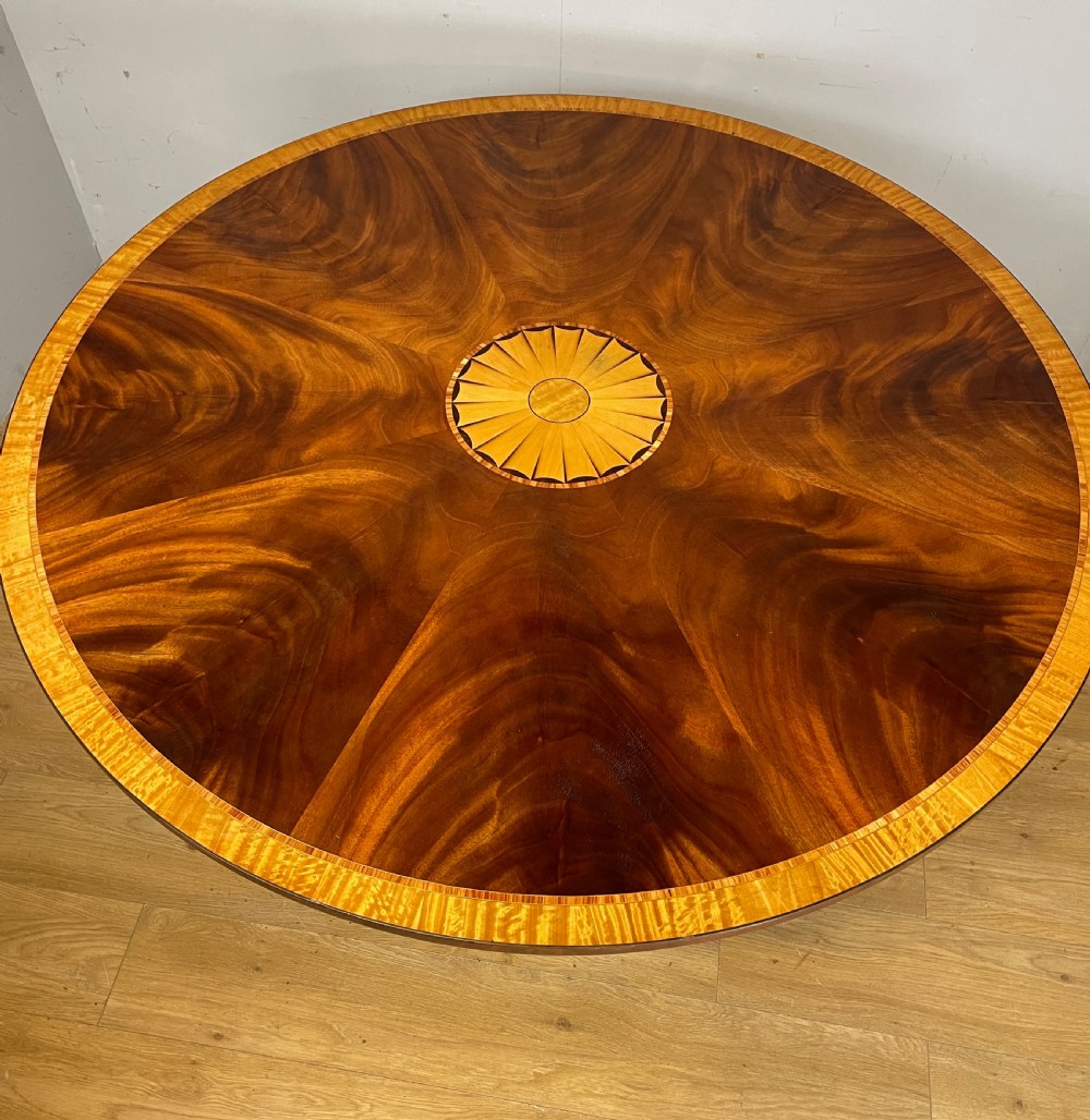 Flame mahogany regency style circular dining table circa 1920 View IV