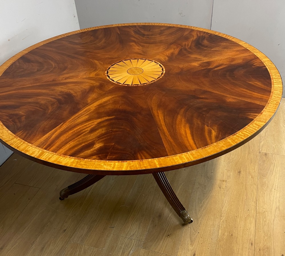 Flame mahogany regency style circular dining table circa 1920 View VI