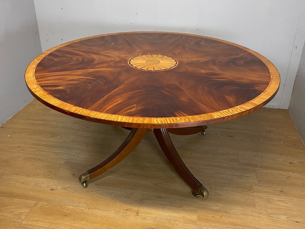 Flame mahogany regency style circular dining table circa 1920 View VIII