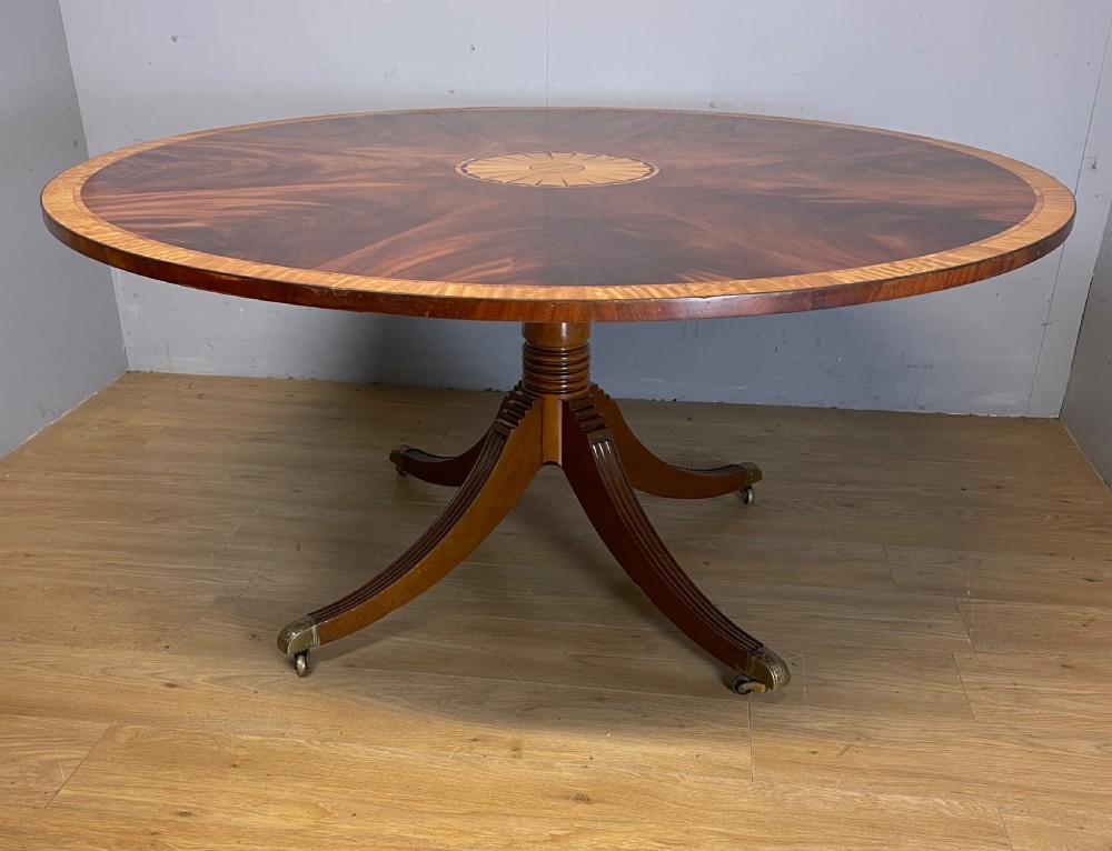 Flame mahogany regency style circular dining table circa 1920 View IX