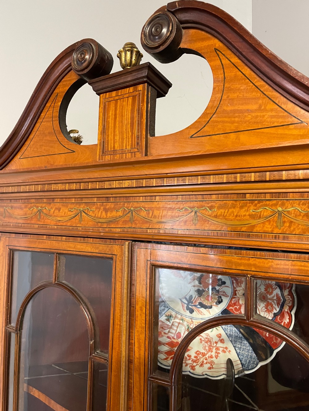 C19TH Sheraton revival painted and inlaid satinwood standing corner cupboard  View III
