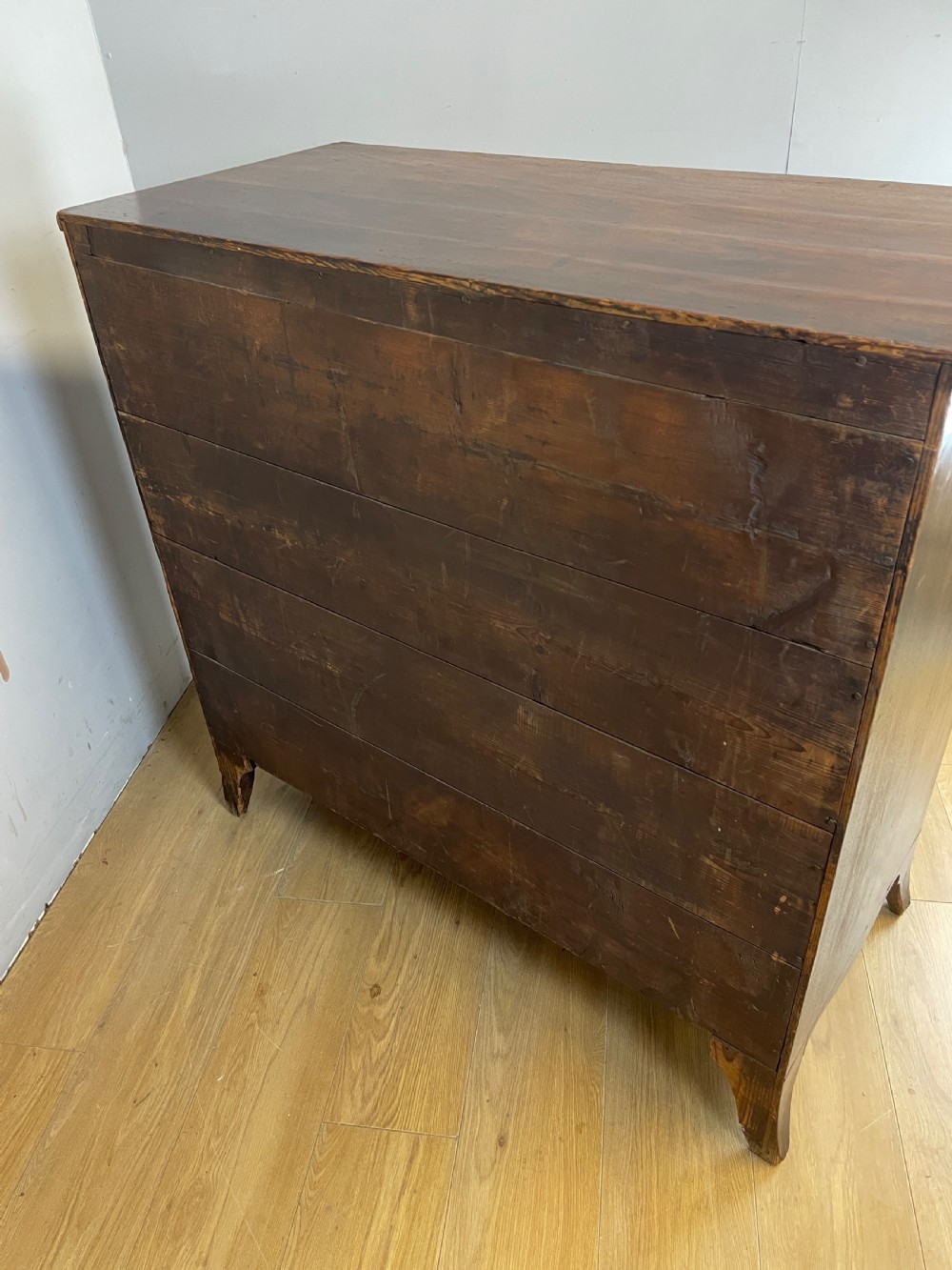 George III mahogany chest of drawers on splayed feet  View X