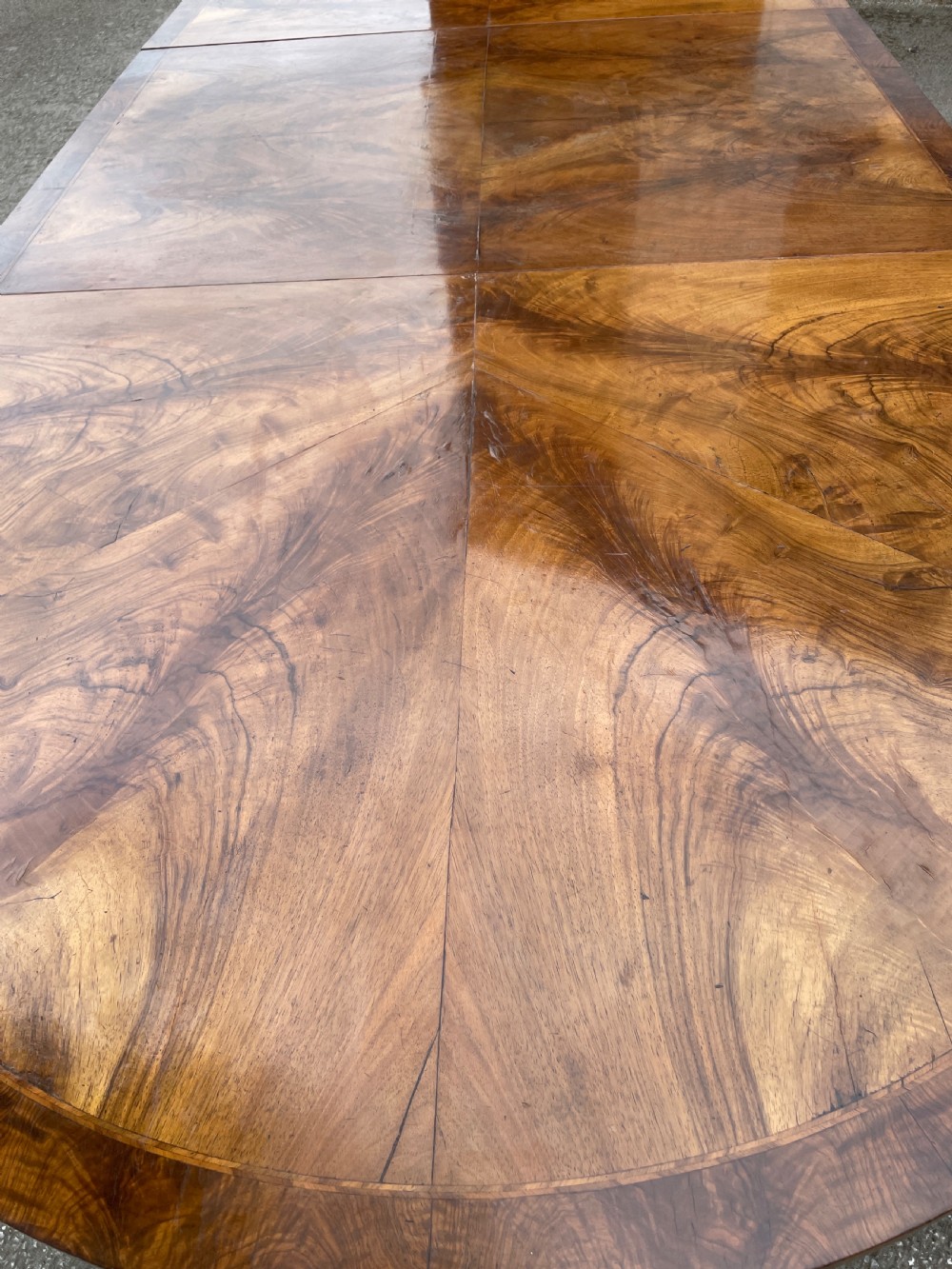Edwardian three pillar flame mahogany 8 seater dining table  View XII