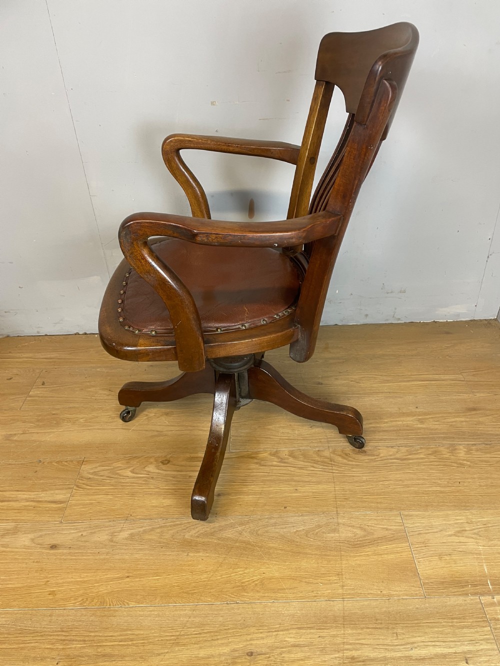 Edwardian mahogany revolving desk chair with leather seat  View IX