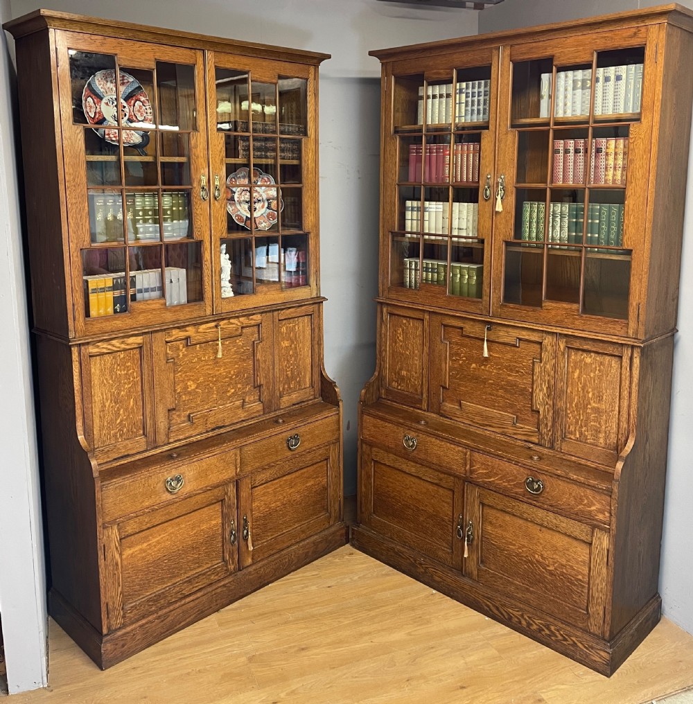 Pair of country house Arts and Crafts golden oak library bookcases 