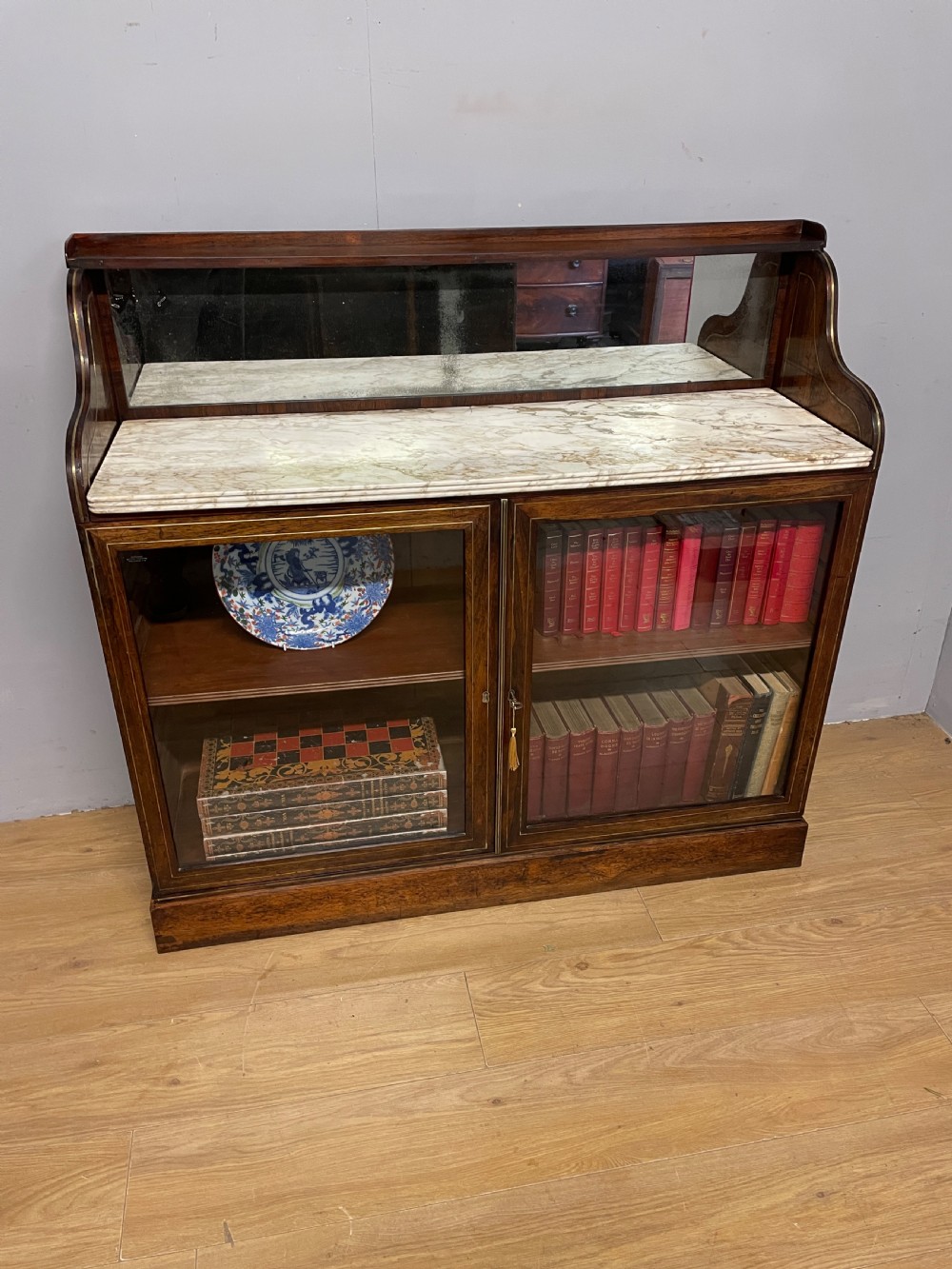 Regency rosewood brass inlaid marble topped bookcase circa 1820 View II