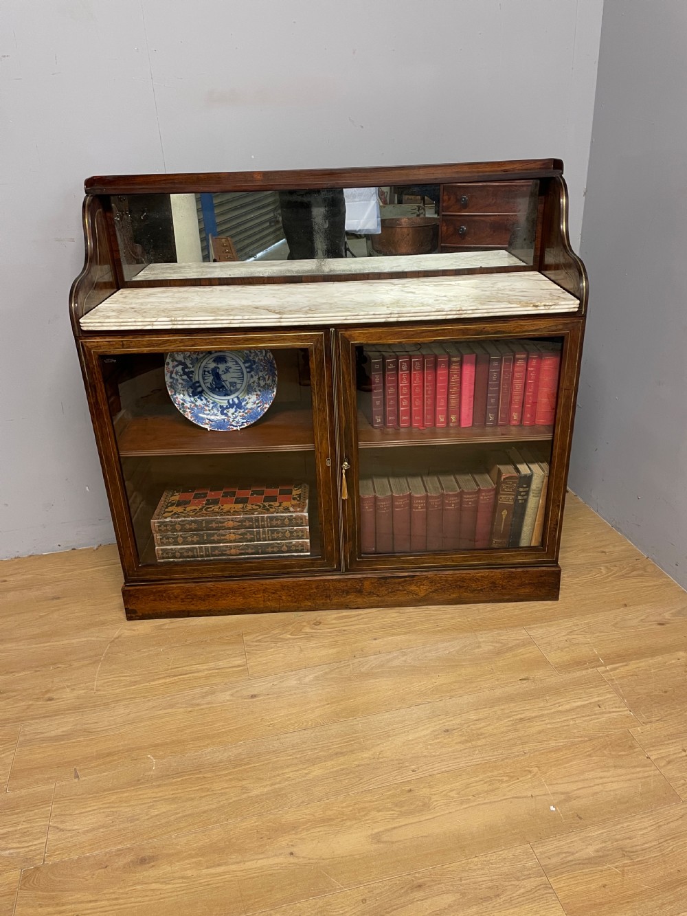 Regency rosewood brass inlaid marble topped bookcase circa 1820 View III