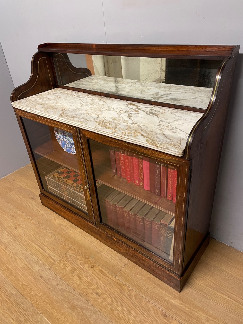 Regency rosewood brass inlaid marble topped bookcase circa 1820 View V