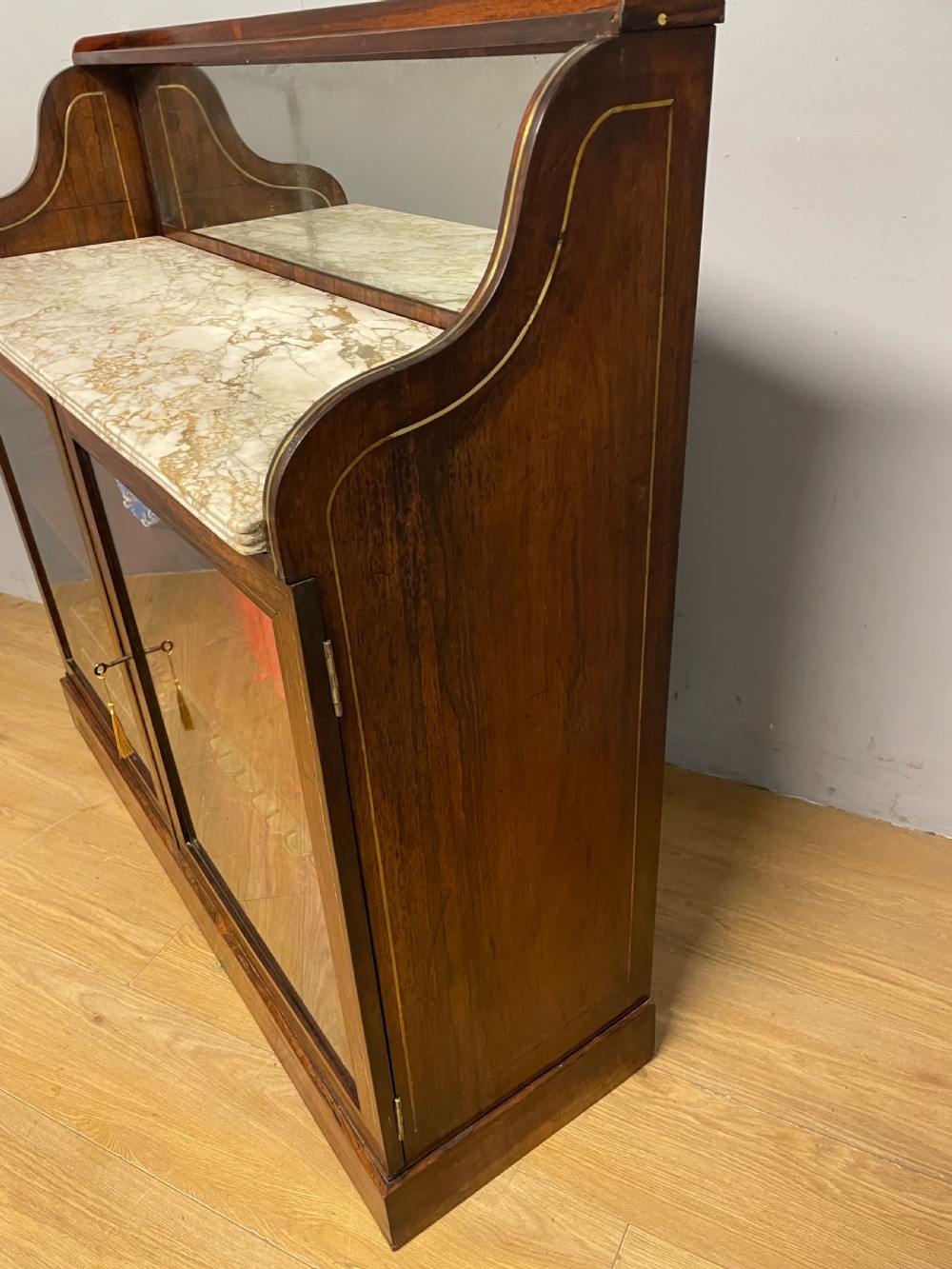 Regency rosewood brass inlaid marble topped bookcase circa 1820 View X