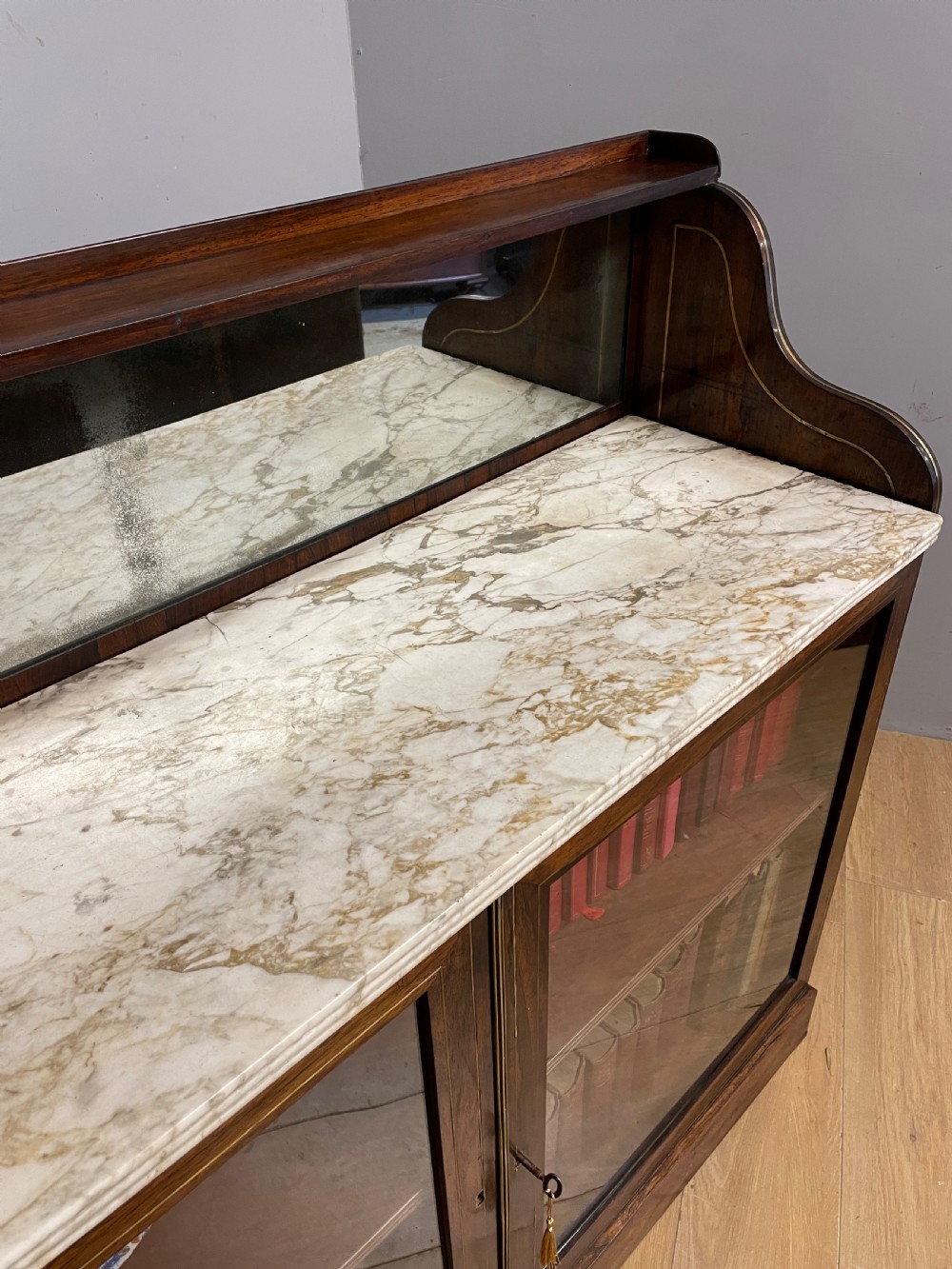 Regency rosewood brass inlaid marble topped bookcase circa 1820 View XIII
