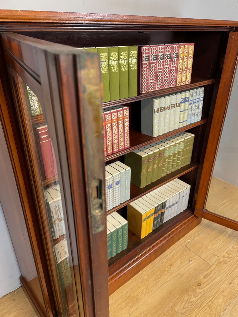 Arts and Crafts walnut freestanding glazed bookcase View IX